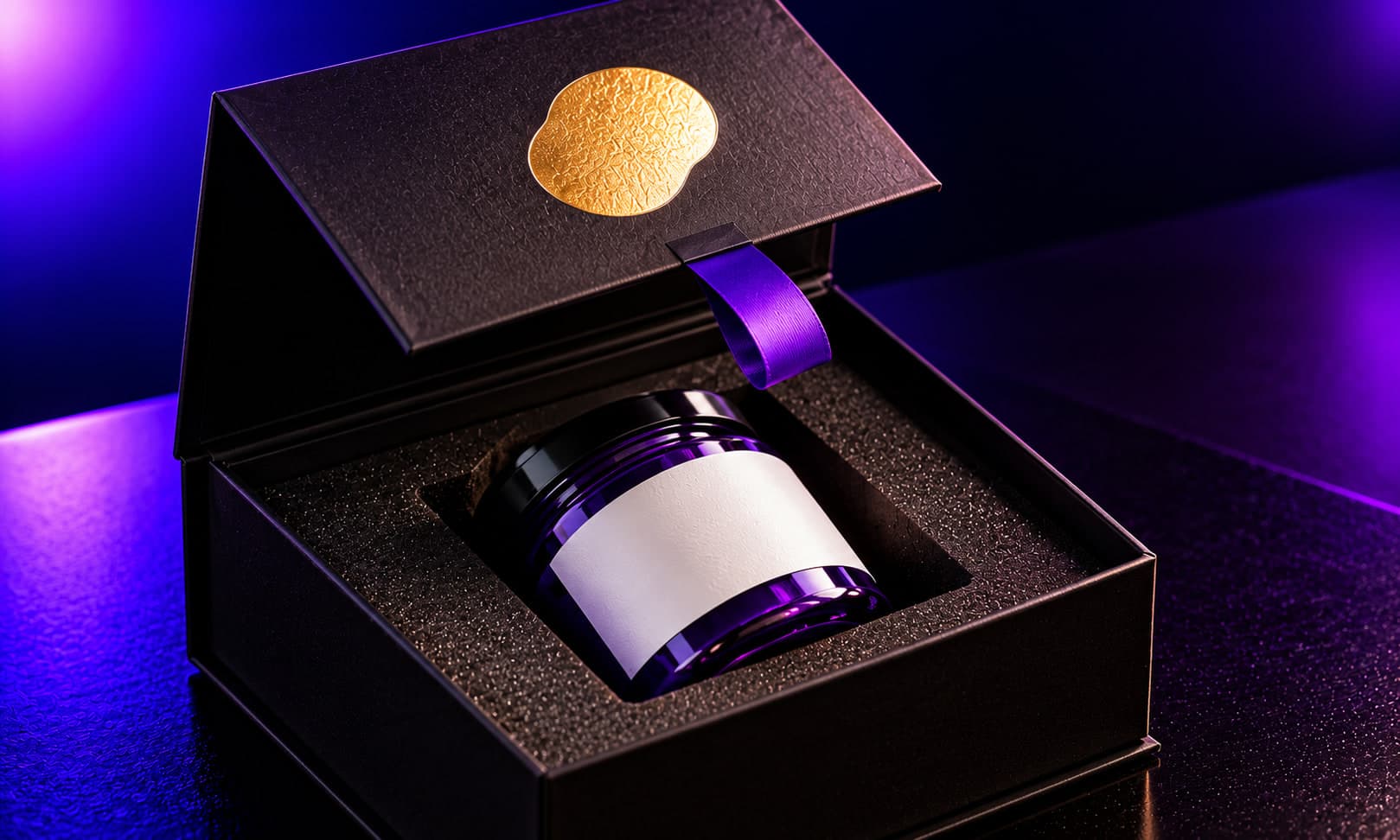 A black magnetic-closure rigid box with a gold foil mark, its lid lifting on a violet ribbon to reveal a jar in a fitted foam insert